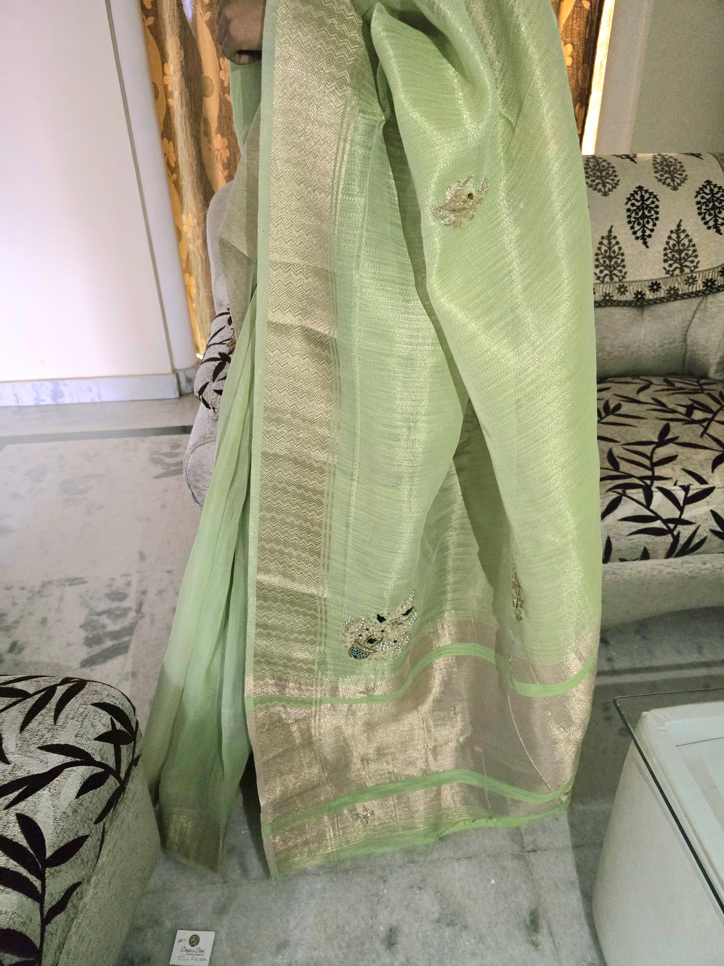 Pastel Green tissue saree with handwork and zari border