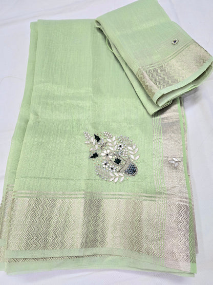 Pastel Green tissue saree with handwork and zari border