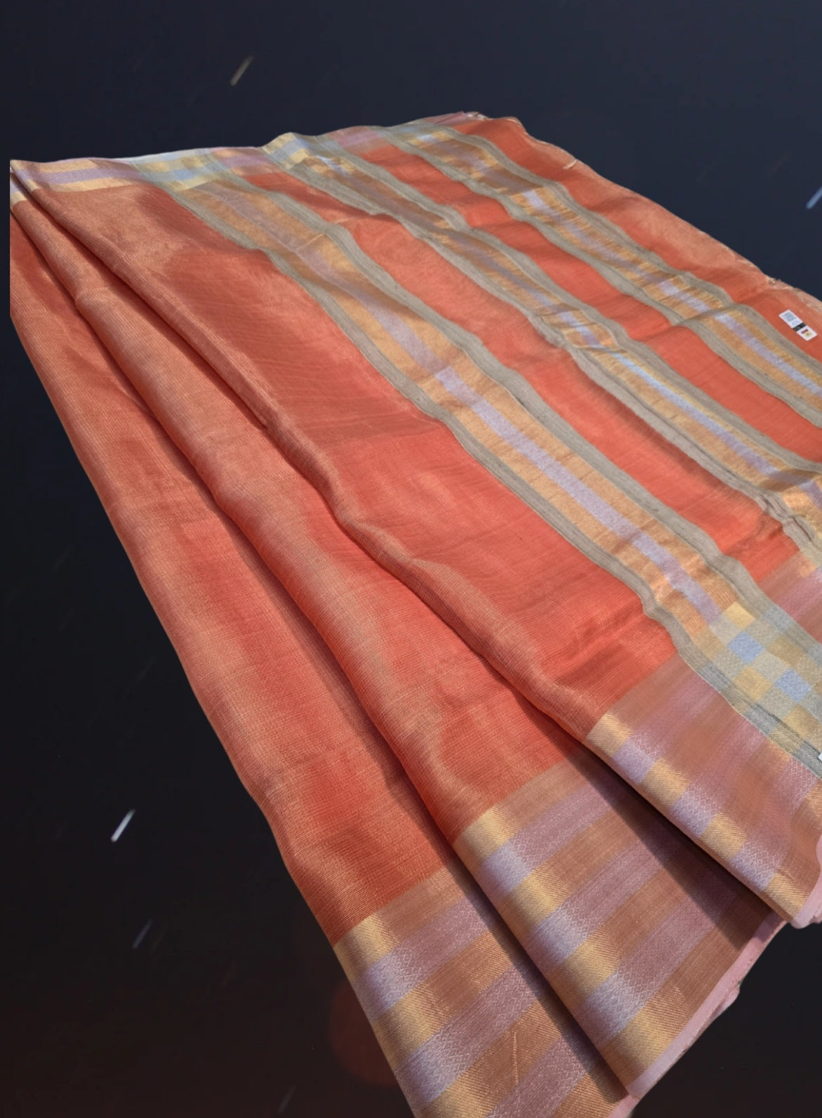 Pastel orange tusser tissue saree from chattisgarh handloom .