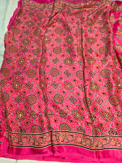 Pink colour ajrakh block printed modal silk saree with tissue pallu