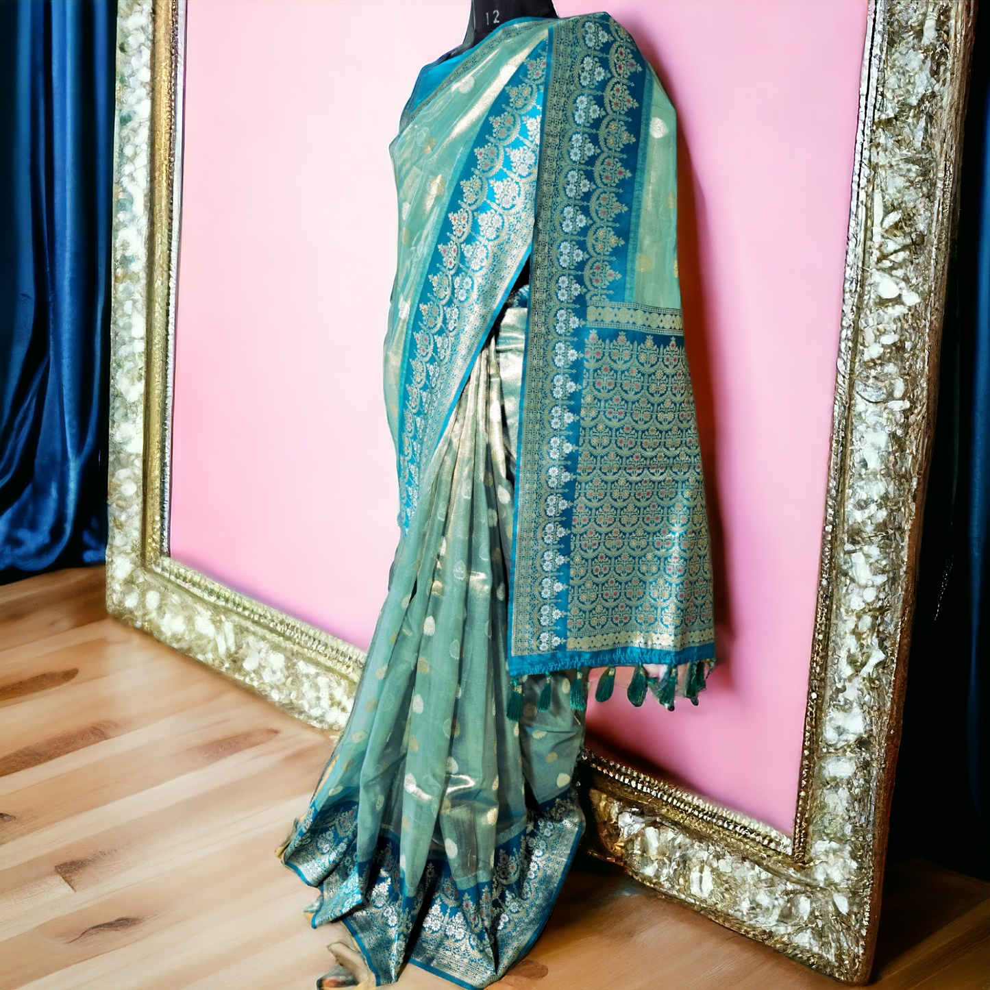 Pastel green paper tissue saree with zari border and pallu