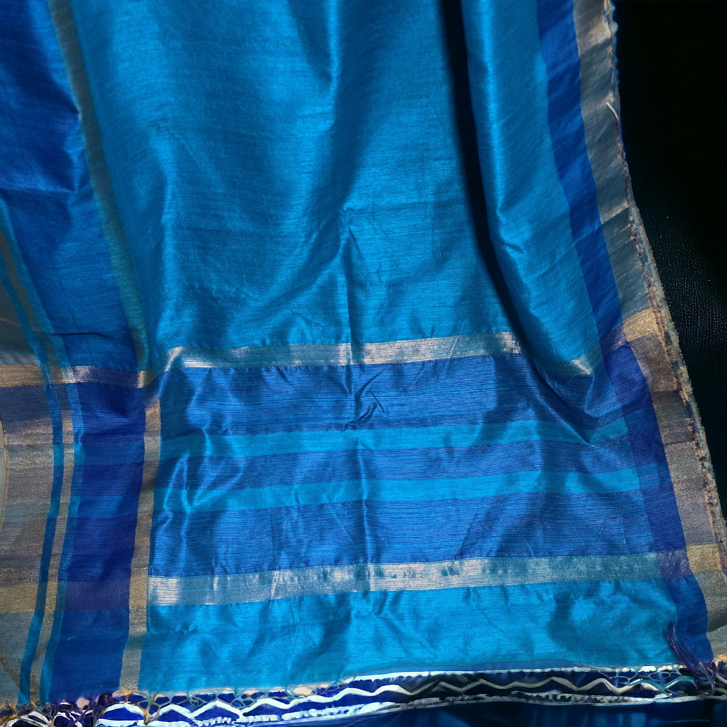 Turquoise Blue raw silk saree with contrast border and pallu