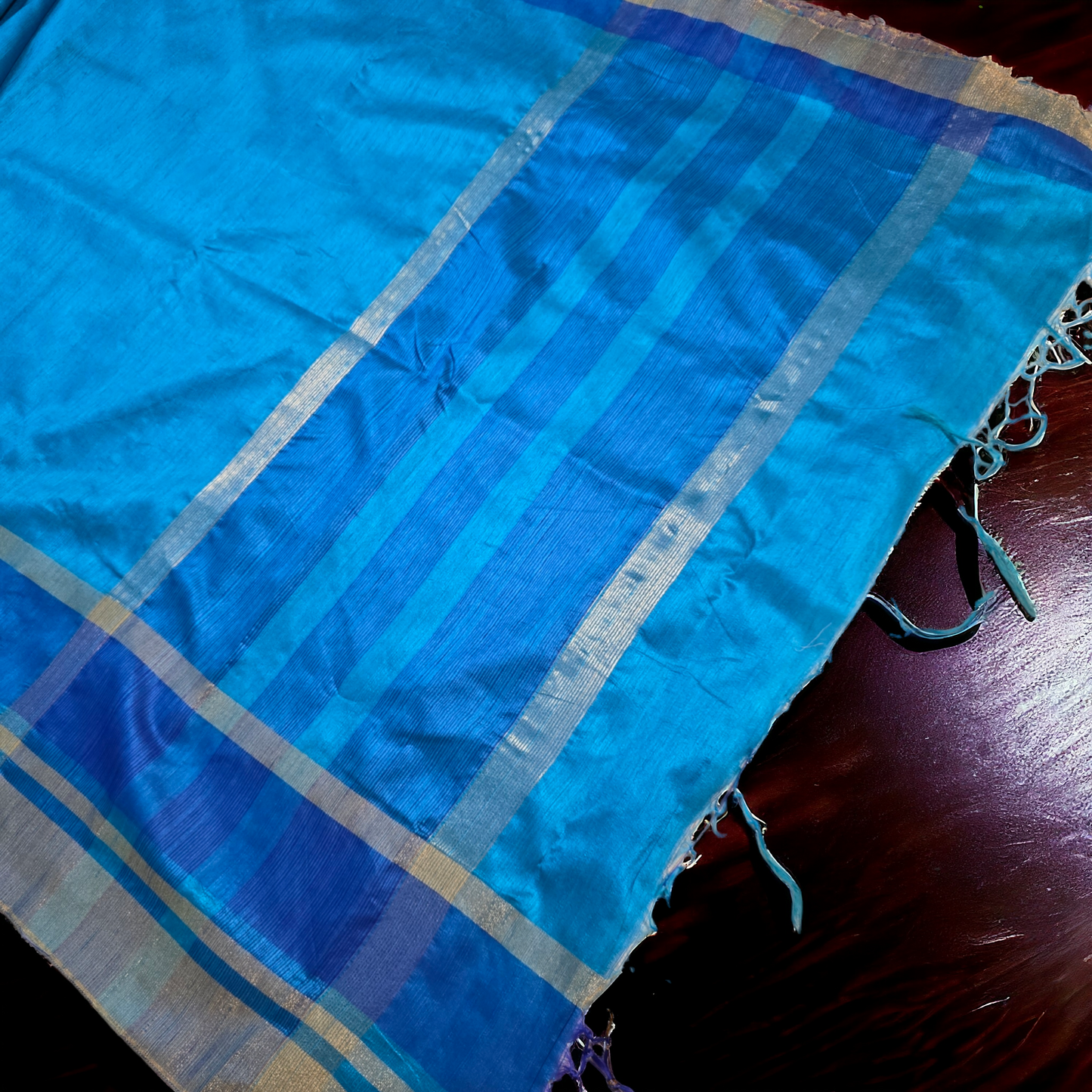 Turquoise Blue raw silk saree with contrast border and pallu