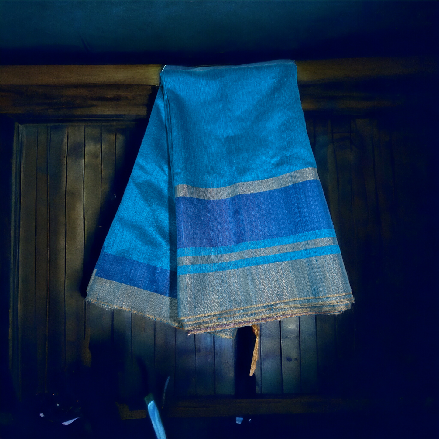 Turquoise Blue raw silk saree with contrast border and pallu