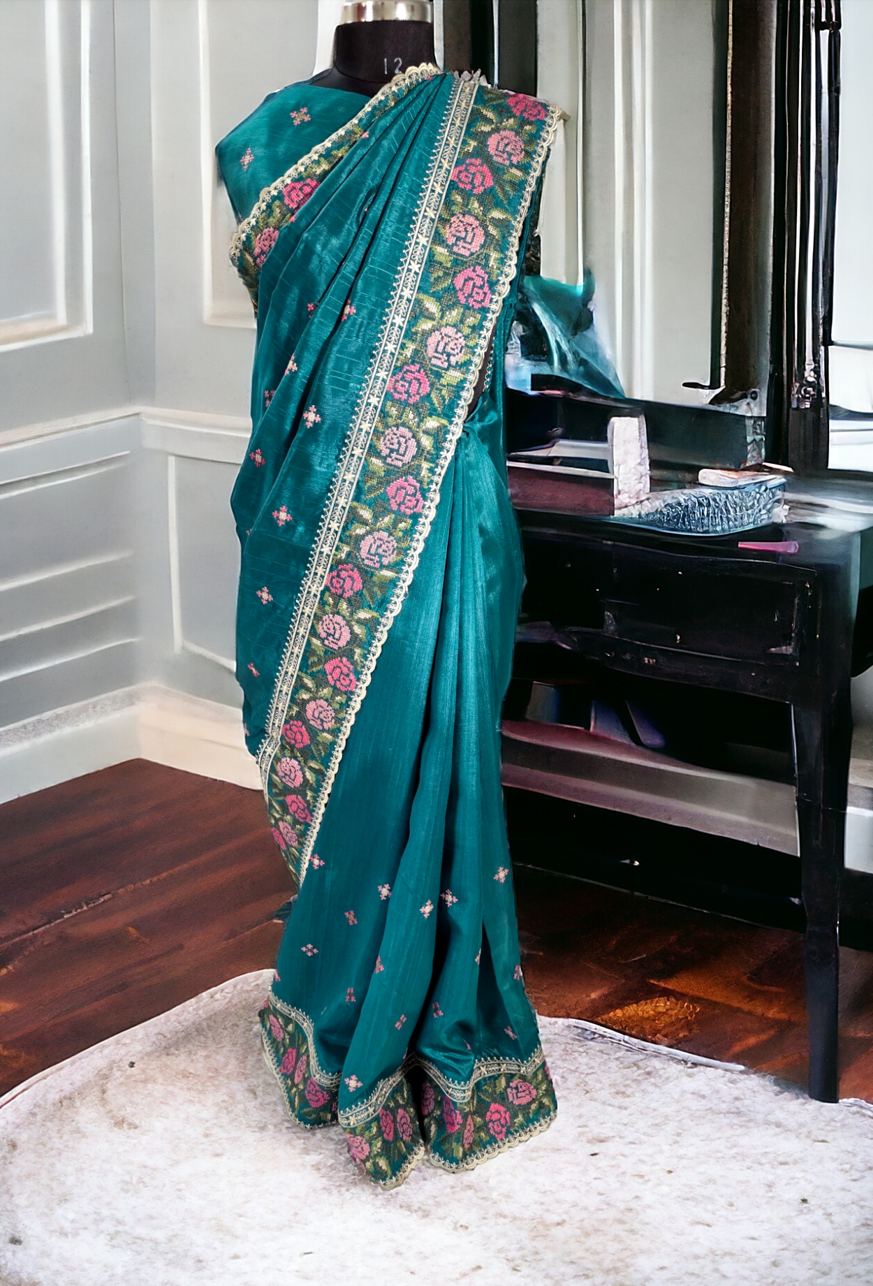 Green silk saree with cross stitch embroidary  border and pallu