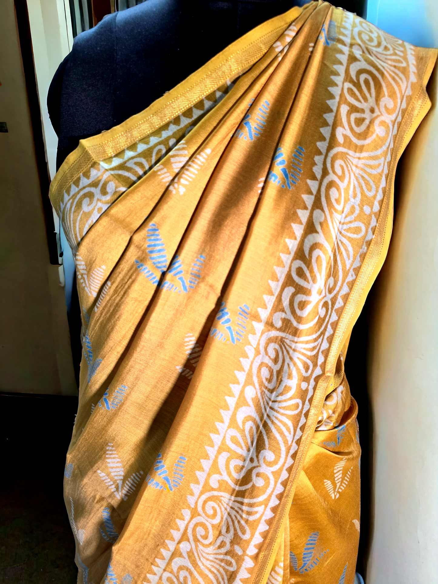 Yellow colour block printed pure meheshwari silk saree.