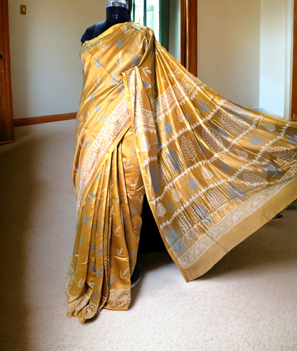 Yellow colour block printed pure meheshwari silk saree.