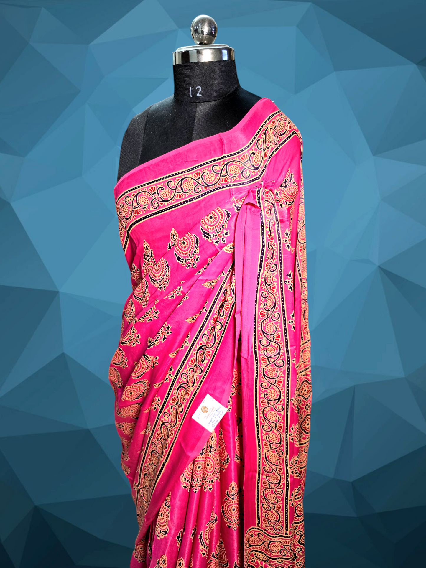 Pink colour ajrakh block printed modal silk saree with tissue pallu