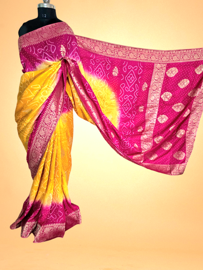 Yellow and Pink Crepe Georgette Bandhani Saree